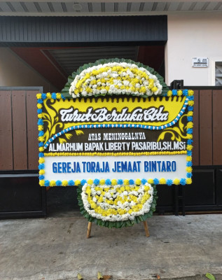 Papan Bunga Duka di Vi Suku